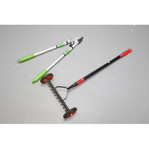 651 - Two Garden Tools To Include Branch Loppers, And Darlac Scarifier