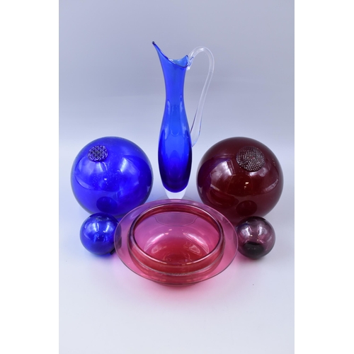 723 - Four Reproduction Glass Fishing Floats (Cranberry and Blue Glass), Cranberry Glass Dish, And Blue Gl... 