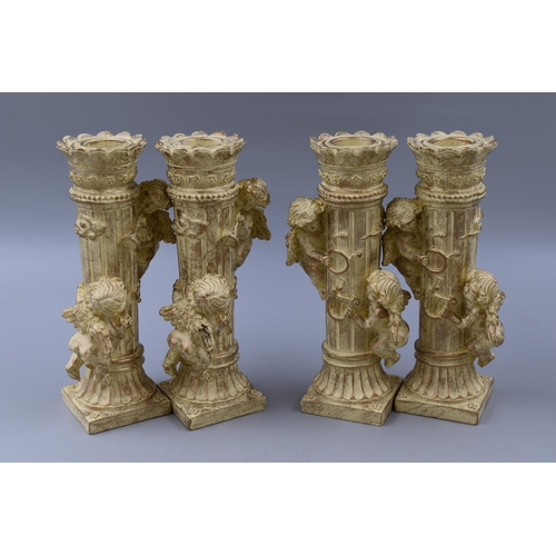 672 - Four Cream and Gold Cherub Column Candle Holders, Approx 7