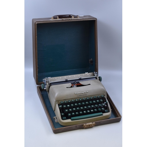 471 - Vintage Cased Remington Travel-Riter Typewriter seems to be in very nice condition