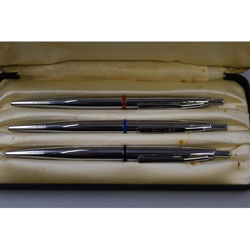 40 - A Set of Three Conway Stewart Ball Point Pens, In Presentation Case. Red, Blue and Black