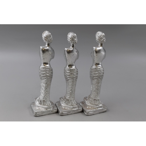 211 - Three Cast Metal Indian Female Figures (7