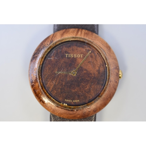 76 - A Tissot Woodwatch Quartz Gents Watch With Leather Strap. Working