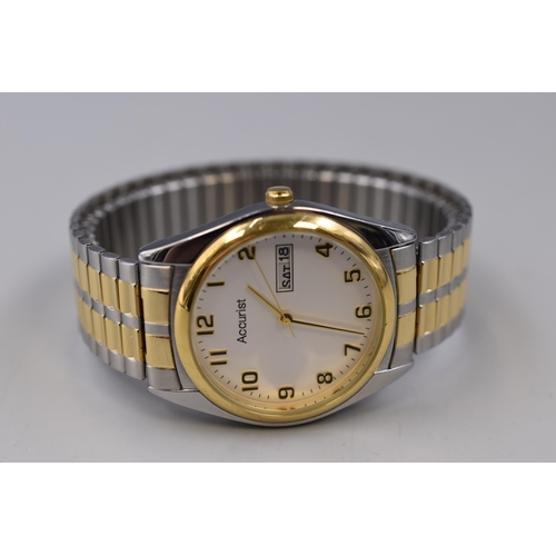 78 - An Accurist Day/Date Quartz Gents Watch, Gold and Silver Tone. Working