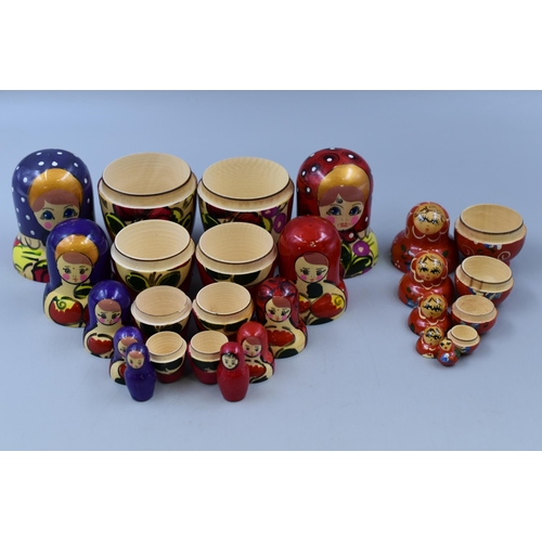 175 - Three Hand Carved and Hand Painted Russian Dolls