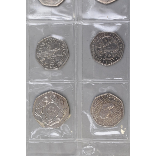 116 - Eight Collectable 50p Coins including Victoria Cross, Peter Rabbit, Sherlock Holmes, Battle of Hasti... 