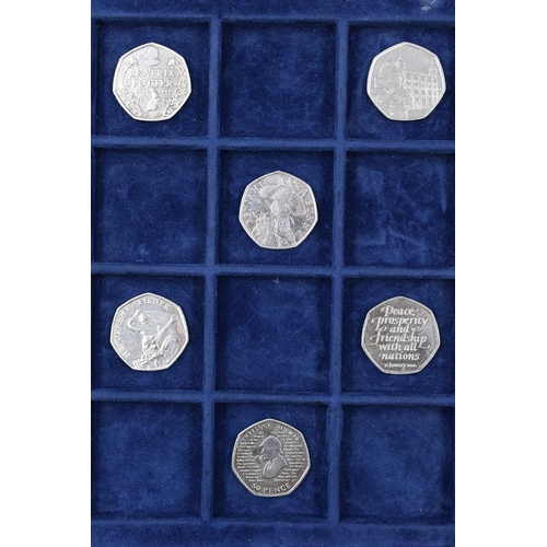 119 - A Selection of Ten Collectable 50p Coins To Include Beatrix Potter, Paddington, And Sherlock Holmes