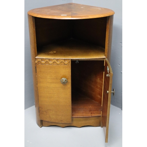 530 - Teak tear drop shaped corner unit with single self and cupboard space (29