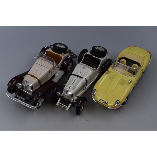 144 - Three Bburago Die Cast 1:18 Scale Model Cars, To Include Jaguar E, Mercedes Benz, And Other Mercedes... 