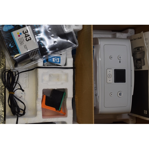 504 - Two Boxed Compact Photo Printers To Include Canon Selphy (CP1300), And HP Invent Photosmart 335. Unt... 