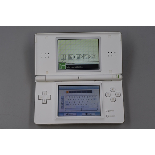 396 - A Nintendo DS Lite (White), In Case. Working