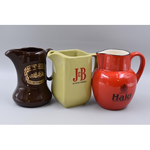 285 - Selection of 5 Whisky Water Jugs by Wade and Carltonware including Bells, Haig, Bowmore and More