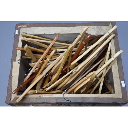 788 - LARGE Collection of Quality Wooden Coat Hangers in a Vintage Wooden Tea Chest