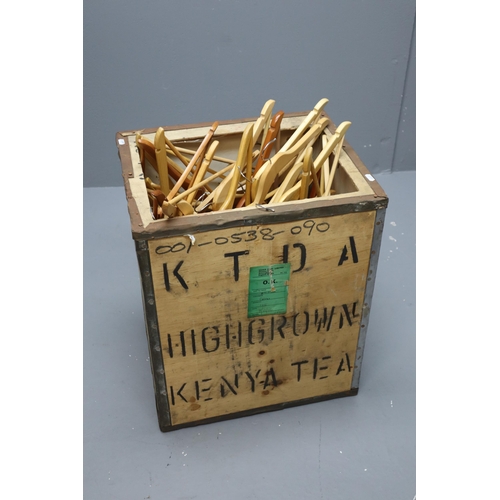 788 - LARGE Collection of Quality Wooden Coat Hangers in a Vintage Wooden Tea Chest