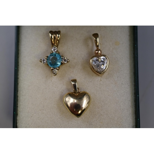 10 - Three Gold 375 (9ct) Pendants