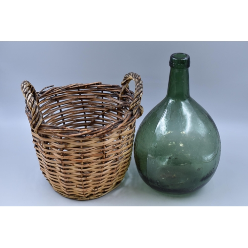 428 - Vintage Demijohn in Woven Rattan Basket (13