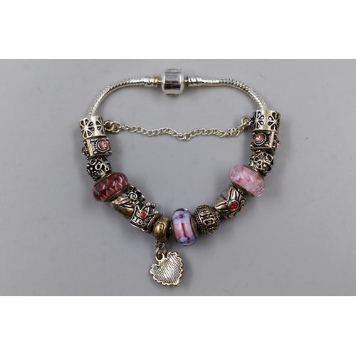 76 - A 925. Silver Charm Bracelet With Various Charms (Some of Which Marked 925. Silver)