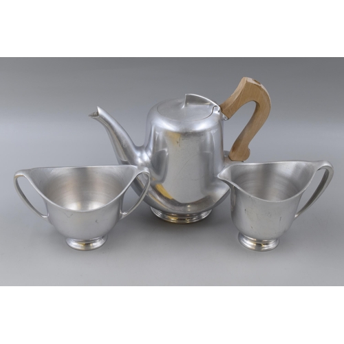 419 - A Three Piece Picquot Ware Retro Tea Service (Teapot, Milk Jug, Sugar Bowl)