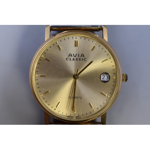 133 - A 9ct (375) Gold Cased Avia Classic Day/Time Quartz Watch