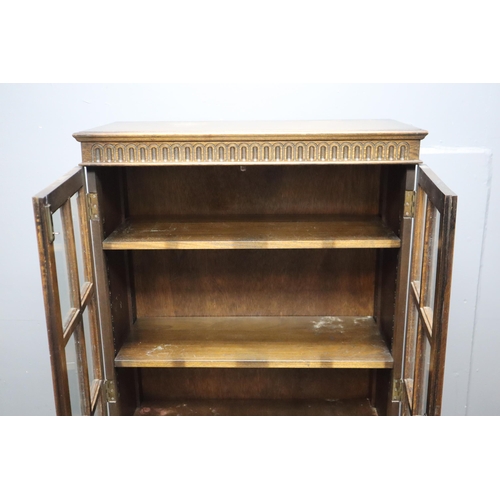 588 - Antique dark wooden display unit with two shelves and storage space at the bottom (53