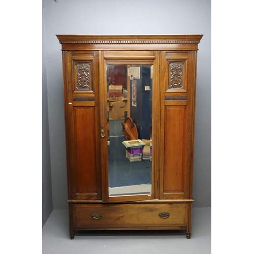 636 - Antique dark wooden wardrobe with single drawer and single door with long length mirror (78.5