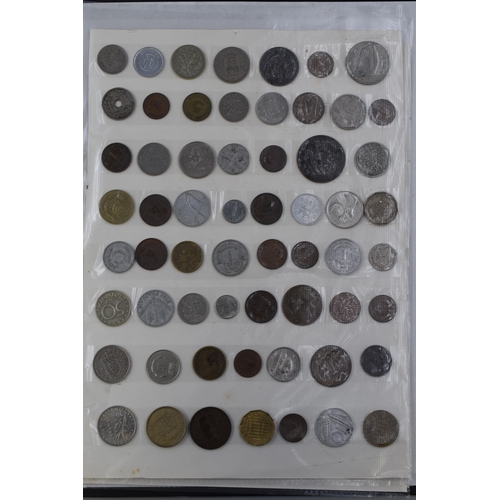 185 - A Folder Containing Over 200 UK and Worldwide Coinage