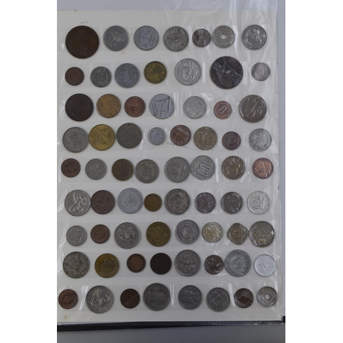 185 - A Folder Containing Over 200 UK and Worldwide Coinage