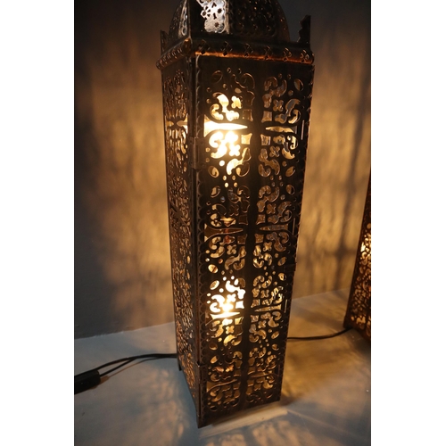 648 - A Pair of Moroccan Style Floor Lamps, Both With Metal Frames and Internal Unusual Spiral Bulbs. Ligh... 