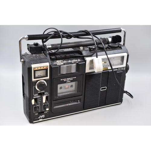 602 - JVC RC-525 mono boombox/radio cassate recorder with a zoom shooter microphone with 5 led peak indica... 