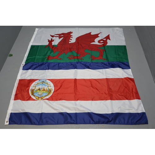 608 - A Selection of Various Worldwide Flags To Include USA, Cuba, Wales, Portugal, And More