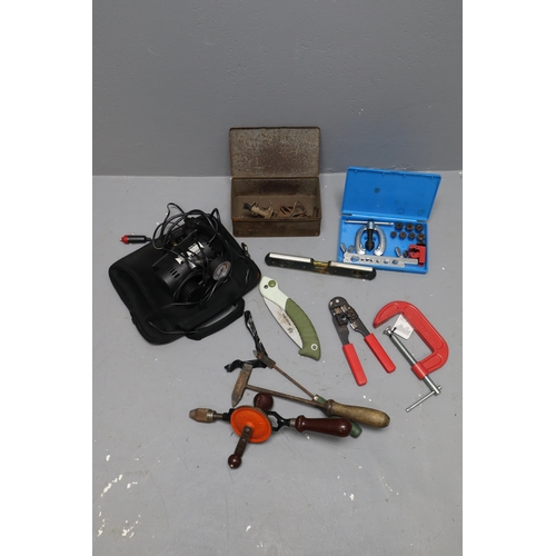 760 - Mixed lots of tools include a mini air compressor, manual batter tester, tatical folding saw, spirit... 