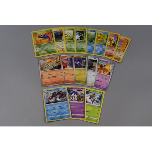 211 - Three Tins of Various Modern Pokemon Cards, To Include Holos