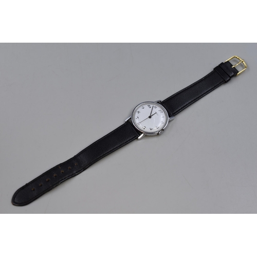 79 - Timex mechanical watch with white face and black leather strap working