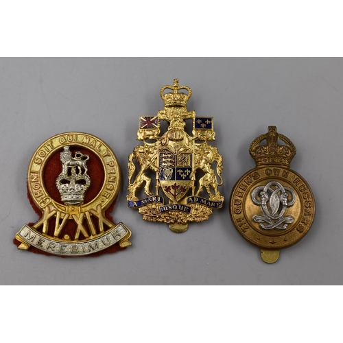 312 - Three Military Badges including Queens Own Hussars, 15th / 19th Kings Royal Hussars and Canadian Arm... 