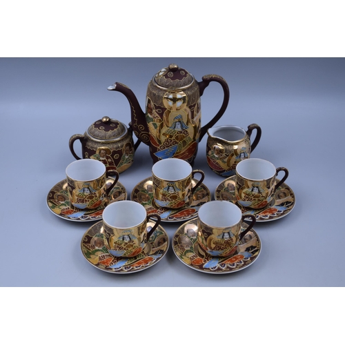 326 - Satsuma Japanese porcelain coffee set 5 saucers 5 small cups, 1 small jug, 1 larger jug and 1 pot