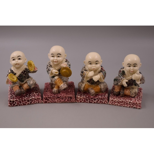 327 - Four Buddhist Monk Figures (4.5