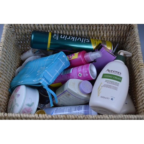 799 - Box of cosmetic items this includes silvikrin hairspray firm hold, aveeno cream, treselle seduction,... 