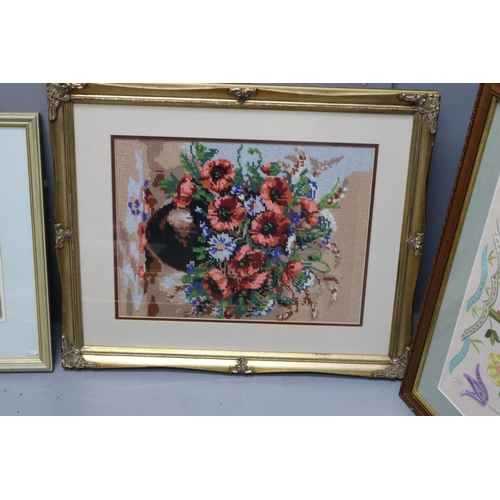 889 - Mixed lot of wall pictures with frames these include mainly flower arrangements and one has a boat o... 