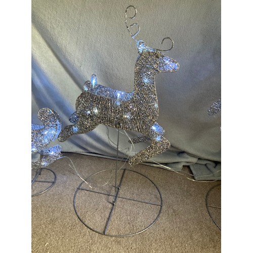 844 - Christmas outdoor multifunction light up sleigh and 2 reindeer on stands, front reindeer is 37