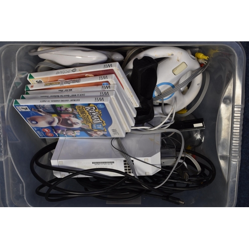 869 - Nintendo Wii complete with Accessories and Five Games Powers on when tested