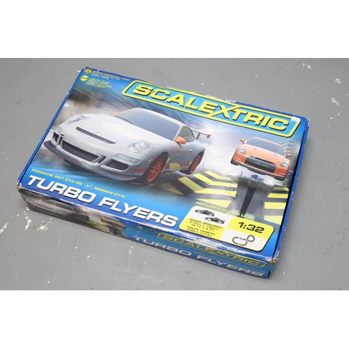 853 - Boxed ScalextricTurbo Flyers to include Porsche 997 GT3 RS and Nissan GT-R seems to be complete