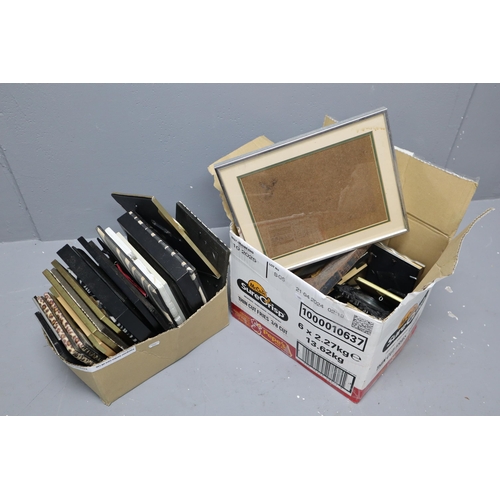 890 - Two Boxes of Various Photo Frames To Include Silver Plated, Animal Prints, Brass Framed and More