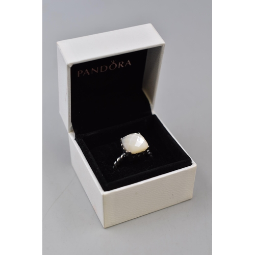 28 - A Pandora Mother of Pearl Stoned Sincerity Ring, In Presentation Box