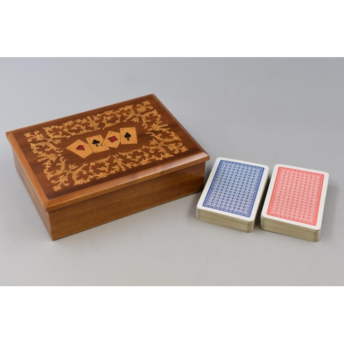 409 - From Sorrento, a Hand Carved Wood Inlaid Marquetry Playing Card Box containing two Packs of Cards