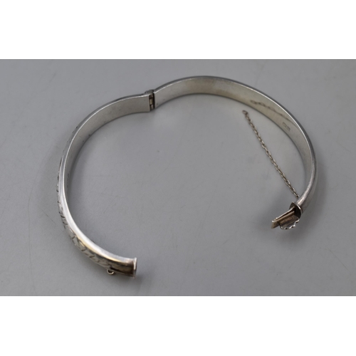 47 - A Hallmarked Joseph Smith & Sons Birmingham Silver Bangle, Circa 1968. Safety Chain Broken