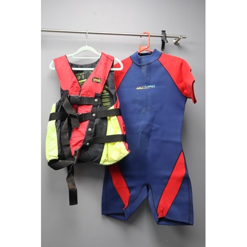 An Olympic Blue and Red Wetsuit (Size Unknown), With Mesle X-Treme Life Vest