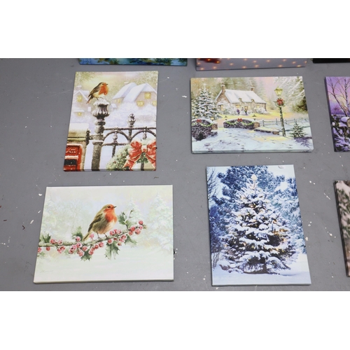 909 - Selection of light up Christmas themed canvas's (some work others flicker, as found)