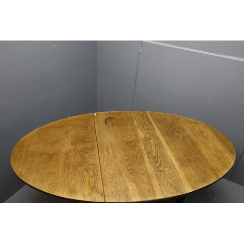 725 - Mid Century Midi Sized Solid Oak Oval Dropleaf Dogleg Table 60