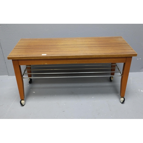 747 - A Vintage Teak Magazine Rack, A 1960's Coffee Table with ladder rack under Shelf sitting on castors ... 