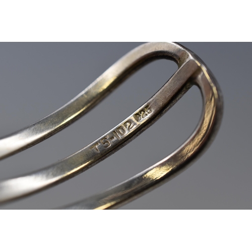 17 - A 925. Silver Three Tiered Wave Bangle